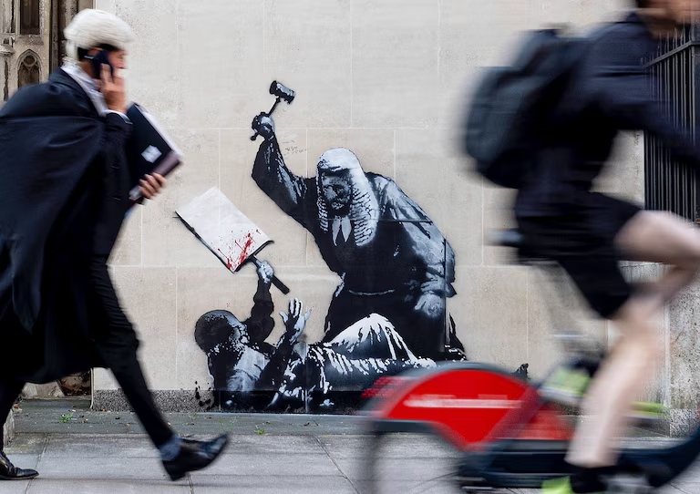 Banksy mural at Royal Courts of Justice removed in London